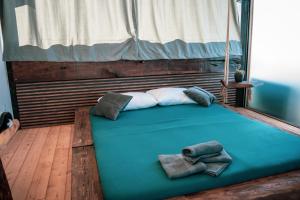 Ένα ή περισσότερα κρεβάτια σε δωμάτιο στο Apartmani Imamovic