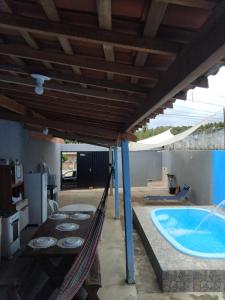 Swimmingpoolen hos eller tæt på Casa temporada Barra de Jequia-Al