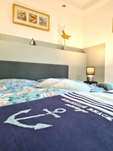 Postel nebo postele na pokoji v ubytování " Michaelas HUUS " zwischen den Meeren, Trappenkamp Holsteinische Schweiz