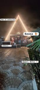 a building with a sign that says samara on it at NatureNest A-Frame Cabin in Gabala