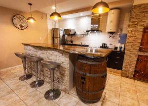 Kuchyň nebo kuchyňský kout v ubytování El jacaranda Alojamiento Diario