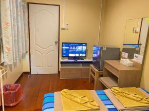 TV/trung tâm giải trí tại Anya House