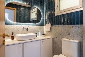 Et badeværelse på Modern Luxury 2BR|Park View & Balcony