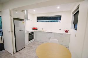 A kitchen or kitchenette at The Riverview BnB