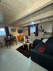 Posezení v ubytování Szyszkowy Zakątek + 43 fotografií