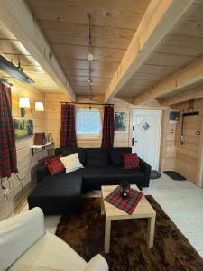 Posezení v ubytování Szyszkowy Zakątek