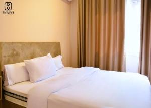 En eller flere senge i et værelse på Al shatby Rooms + 6 billeder