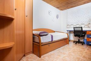 Postel nebo postele na pokoji v ubytování Chalet adosado Anayet + 28 fotografií