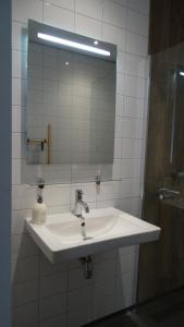 Een badkamer bij Beach Hotel Oostvoorne