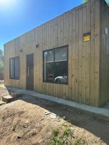 a building with a large window on the side of it at Refugio del Mar 2 in Ocean Park