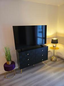 Et tv og/eller underholdning på WohnTraum Kamelienweg, Sauna