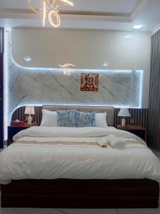 Postel nebo postele na pokoji v ubytování Omnia Luxe Villa