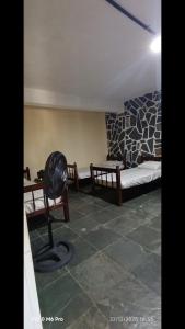 En eller flere senge i et værelse på Pousada Cantinho e Sossego casa 5 + 1 billede