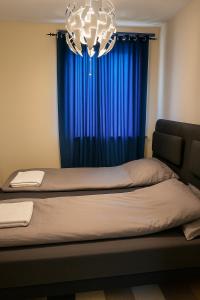 Postel nebo postele na pokoji v ubytování Top floor Helsfyr city central apartment