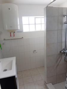 Phòng tắm tại La Oursha Apartment +8 ảnh