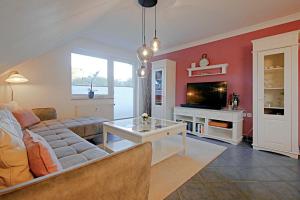 TV/trung tâm giải trí tại Fewo C am Kurpark mit MeineCardPlus in Bestlage!