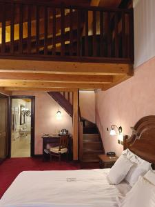 Cama o camas de una habitación en Hotel L' Aiglon