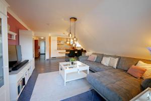 TV/trung tâm giải trí tại Fewo C am Kurpark mit MeineCardPlus in Bestlage! +34 ảnh