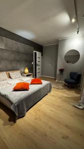 En eller flere senge i et værelse på Willa nad Jeziorem Mikorzyńskim z Mariną