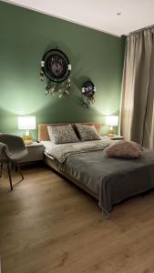 En eller flere senge i et værelse på Willa nad Jeziorem Mikorzyńskim z Mariną