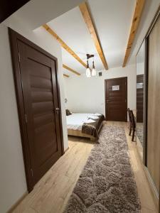 Postel nebo postele na pokoji v ubytování Cabana Parang