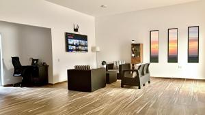 TV a/nebo společenská místnost v ubytování LUZ DE LUNA mesa de los santos house + 77 fotografií