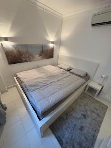 En eller flere senge i et værelse på Apartment AlcudiaMar