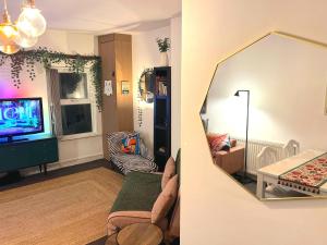 TV/trung tâm giải trí tại COZY Apartment 4