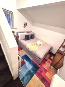 Giường trong phòng chung tại COZY Apartment 4