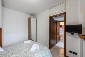 TV a/nebo společenská místnost v ubytování Curiel 194, SmartStay - Appartamento - Ospedale Humanitas, Fiordaliso, Forum Assago