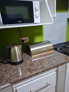 Køkken eller tekøkken på Cosy Cottage Apartments 4 + 5 billeder