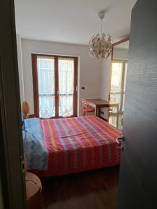 En eller flere senge i et værelse på Casa del Sole