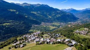 an aerial view of a village in the mountains at Les Balcons de Valezan in La Plagne Tarentaise