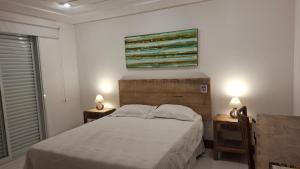 En eller flere senge i et værelse på Casa Lila - Casa com Espetacular View + 36 billeder