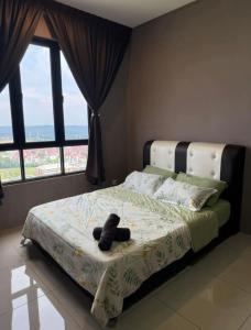 Postel nebo postele na pokoji v ubytování Alisha Homestay at Residensi KLIA near KLIA AIRPORT,SEPANG CIRCUIT,USIM,BANDAR ENSTEK