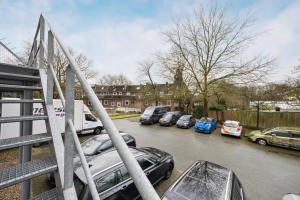 a bunch of cars parked in a parking lot at HanseStay Wandsbek in Hamburg