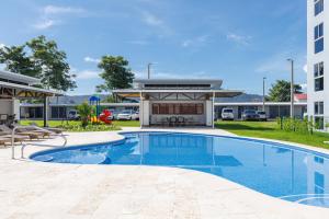 Πισίνα στο ή κοντά στο Viva Jaco Viva Jaco (10-03B)