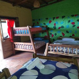 Postel nebo postele na pokoji v ubytování Hotel El Santuario