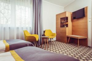 TV a/nebo společenská místnost v ubytování Hotel Vivaldi