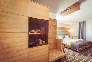 Postel nebo postele na pokoji v ubytování Hotel Vivaldi