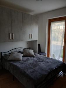 Postel nebo postele na pokoji v ubytování CASA VACANZE RELAX