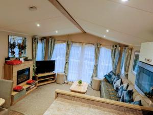 Et tv og/eller underholdning på 3 bedroom Christmas Heaven Home