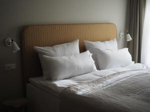 Postel nebo postele na pokoji v ubytování Karls Design Apartments Mittenwald