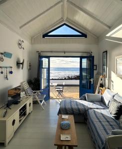 En eller flere senge i et værelse på Apartamento Casita del Mar