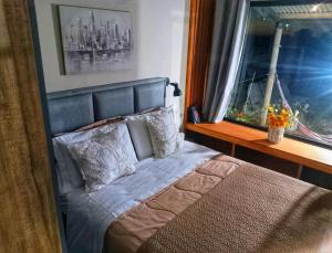 Postel nebo postele na pokoji v ubytování Entre Palmeras y Lavandas