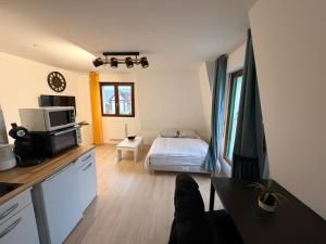 Kuchyň nebo kuchyňský kout v ubytování Studio Vernon 31