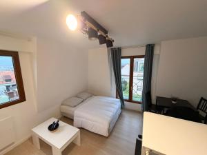 Postel nebo postele na pokoji v ubytování Studio Vernon 31