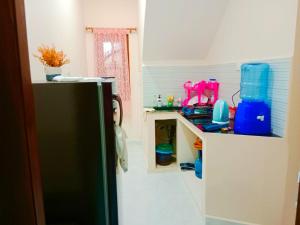 a kitchen with a sink and a counter top at Velu House - 2-Room Apartment in Jaffna +13 photos