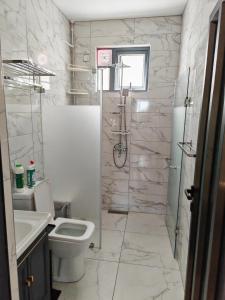 Koupelna v ubytování Blue Legend Tourist Residence