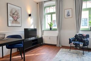 Posezení v ubytování Hip & Minimalist - Stadt Apartments am Malerweg